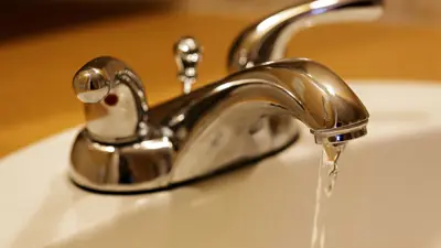 residential bathroom tap running water