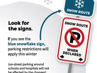 Look for the signs. blue snowflake sign, snow route sign