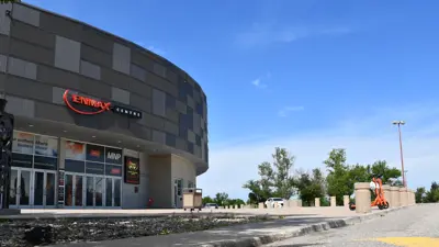 Enmax Building Orange Neuron Scooters 